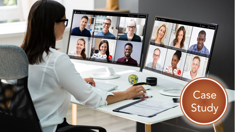 Image of woman working on leadership case study with multiple people looking at her